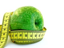 Green Apple With Measuring Tape Stock Photography Green Apple With Measuring Tape Stock Photography