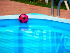 Ball Is Floating In Swimming Pool Stock Photography
