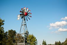 Small Windmill With Blue Sky And Clouds Stock Images Small Windmill With Blue Sky And Clouds Stock Images
