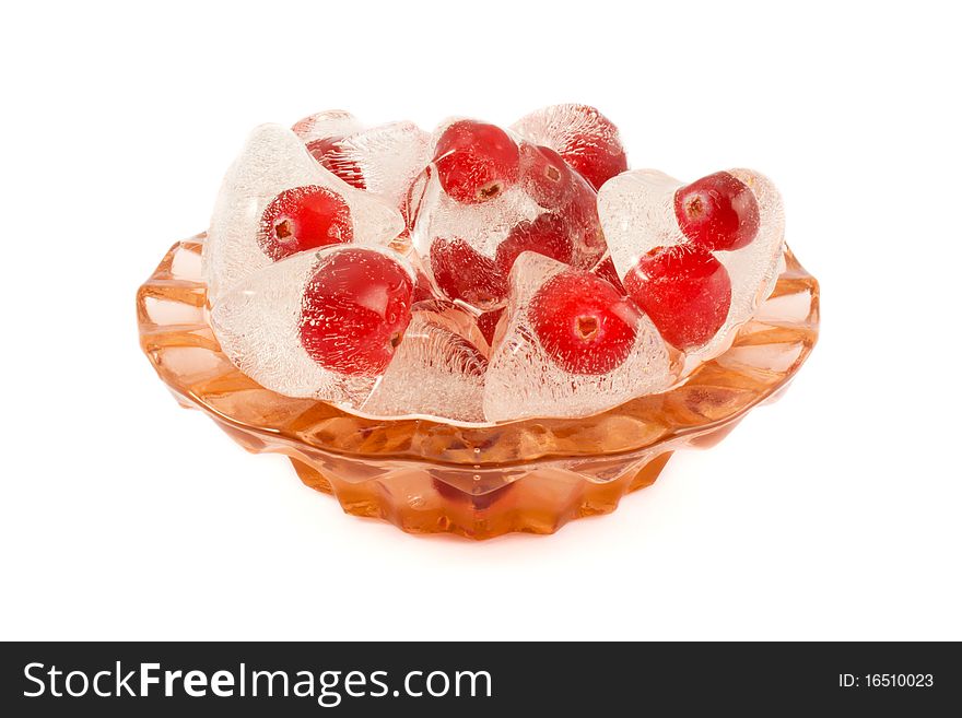 Cranberries in ice on a white background.