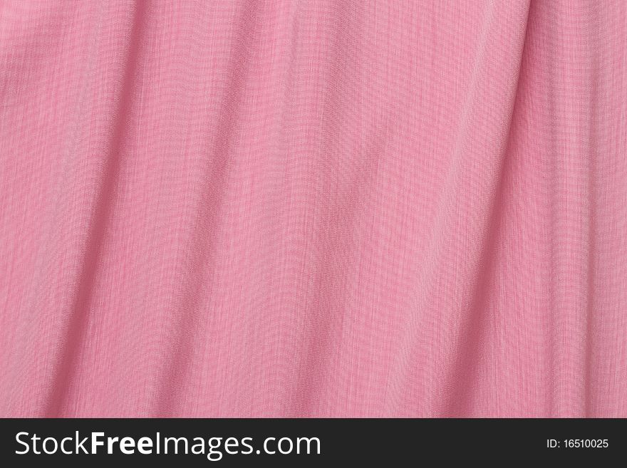 Pink fabric with folds,background
