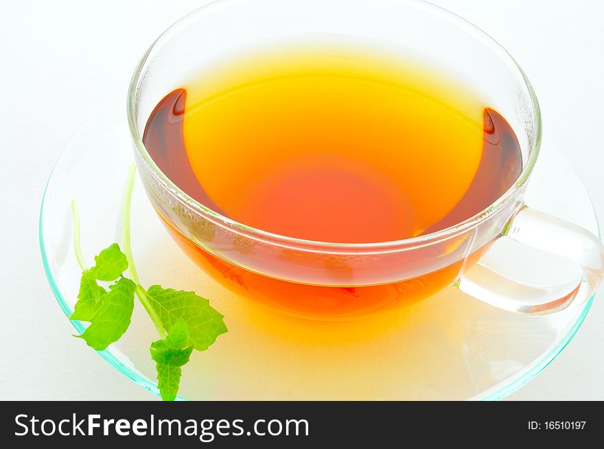 Mint tea in a glass cup. Mint tea in a glass cup.