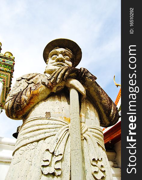 Ancient lord stone statue in Thailand Buddha Temple