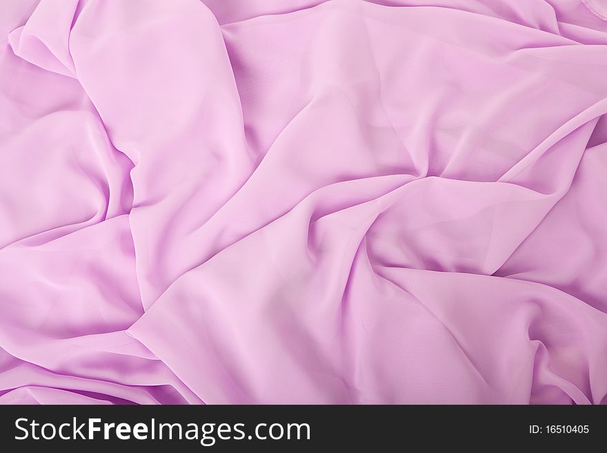 Pink fabric background in this studio shot