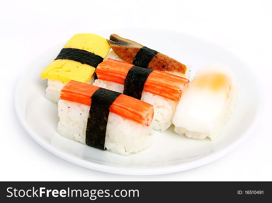 Various types of japanese sushi on plate. Various types of japanese sushi on plate