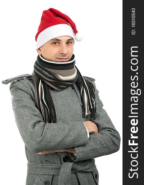 Handsome young man in santa hat isolated on a white