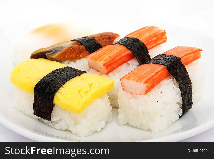 Various types of japanese sushi on plate. Various types of japanese sushi on plate