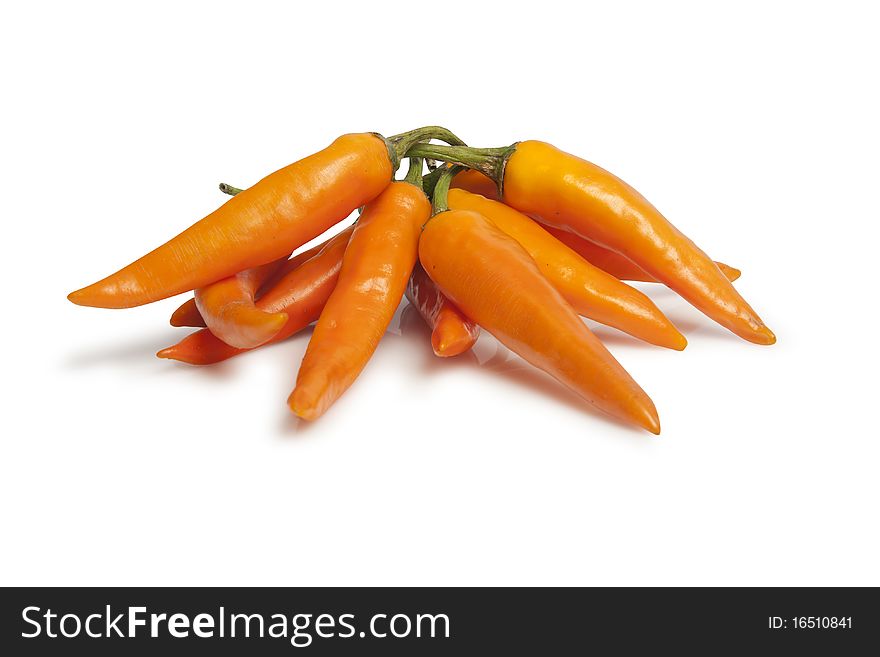 Bunch of orange pepper on a white background