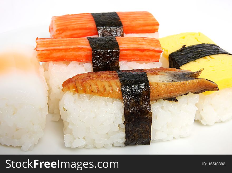 Various types of japanese sushi on plate. Various types of japanese sushi on plate