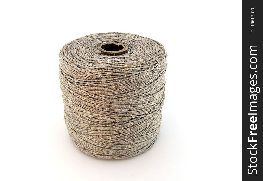 Wool curled into a ball with single thread unreeled