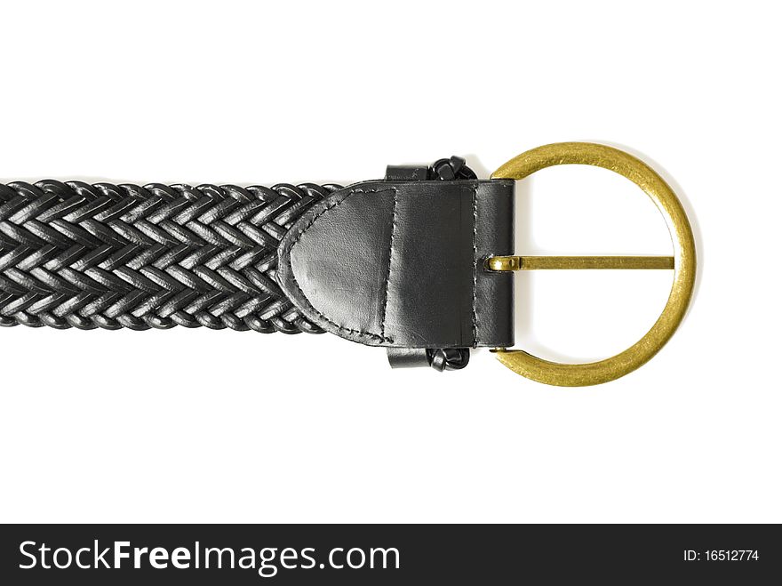 Wattled leather belt with yellow buckle. Isolated on white background. Wattled leather belt with yellow buckle. Isolated on white background