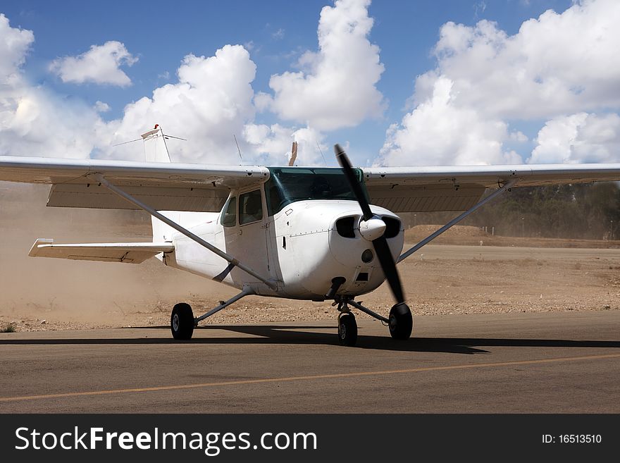 Small airplane in a small desert airport