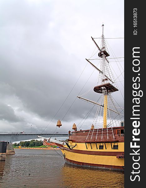 Aging schooner in town harbour