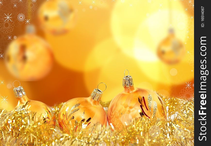 Golden Christmas balls with blur background. Golden Christmas balls with blur background