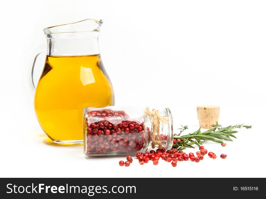 Olive oil and herbs isolated over white