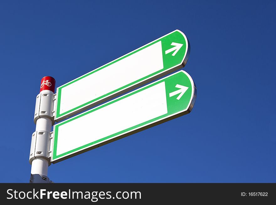 White sign with blue sky