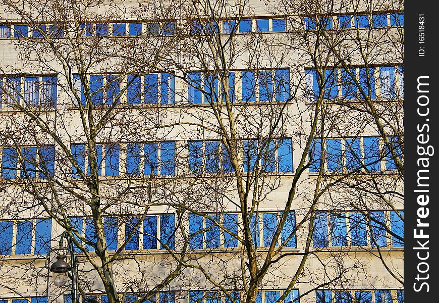 Reflection of the sky in the windows of the building. cityscape