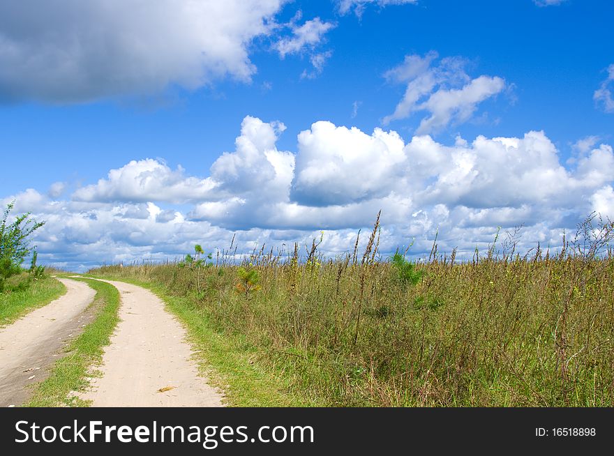 Road lane and deep blue sky. Nature design.