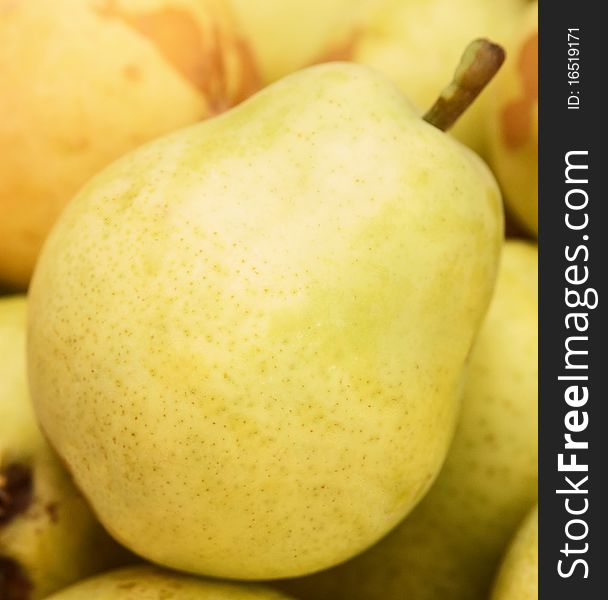 Ripe yellow pear close up