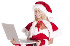Santas Helper Laptop Smiling Royalty Free Stock Photography Santas Helper Laptop Smiling Royalty Free Stock Photography