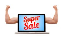 Laptop With Super Sale Sign And Muscular Biceps Royalty Free Stock Photos