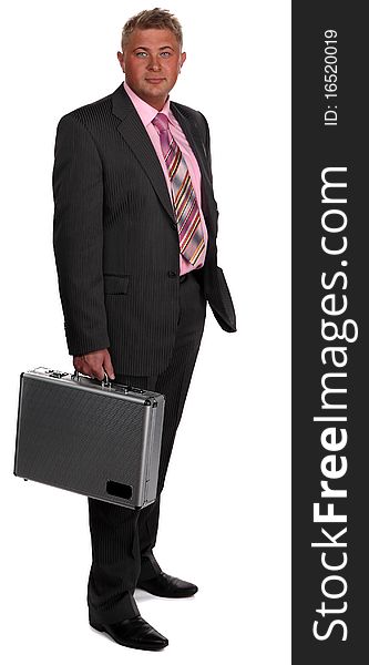 Successful businessman with case on white
