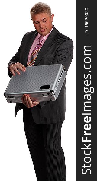 Successful businessman with case on white