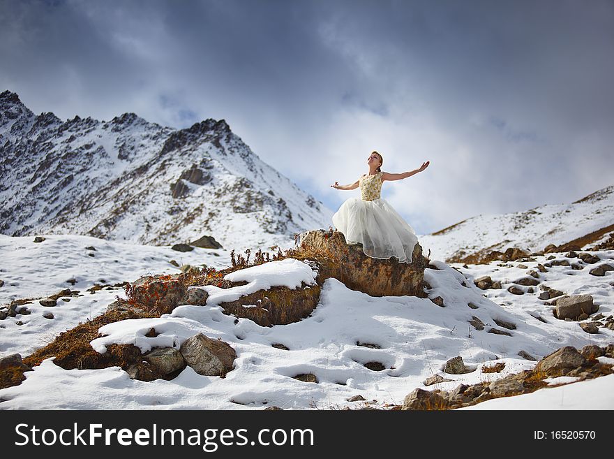 The bride in snow mountains