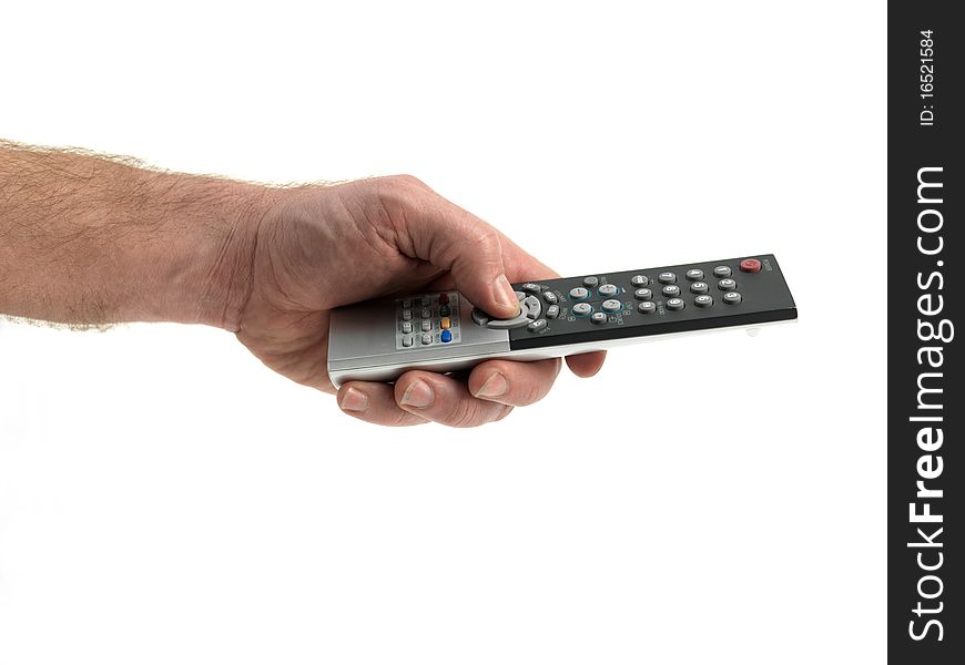 A remote control held in the hand isolated against a white background. A remote control held in the hand isolated against a white background