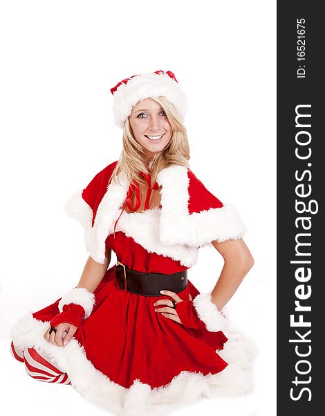 A female dressed as santas helper kneeling