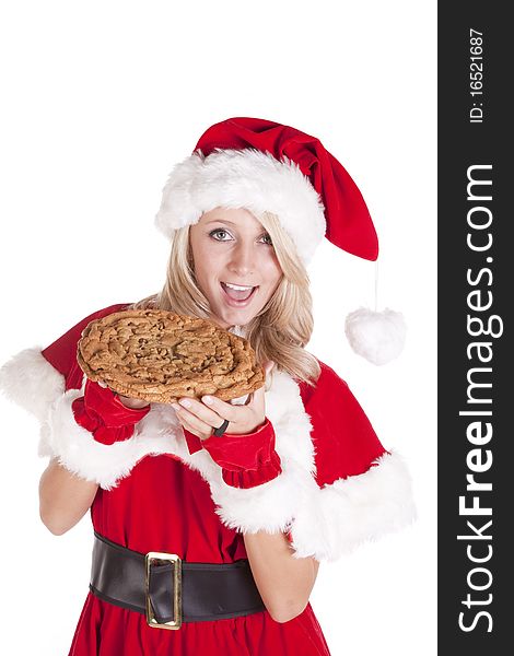 A female dressed like Santa with a big cookie. A female dressed like Santa with a big cookie.