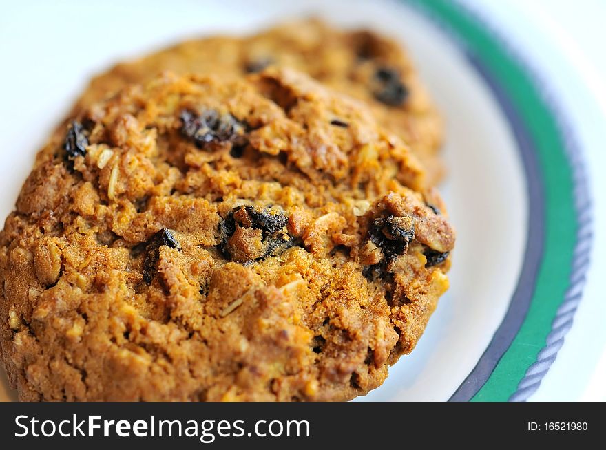 Delicious chocolate chip cookie on plate for afternoon snack