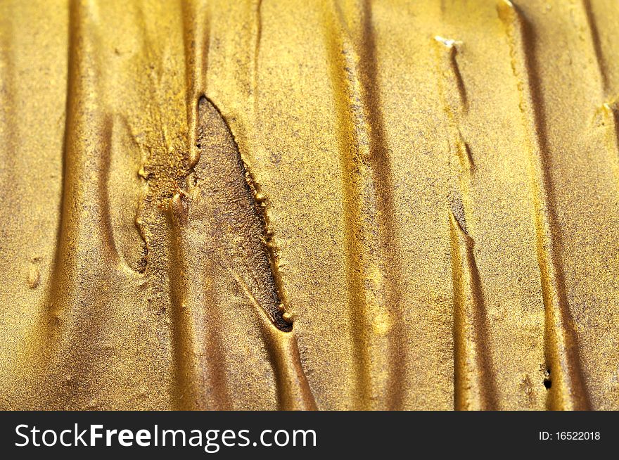 Abstract golden texture with vertical pattern. Suitable for abstract backgrounds and textures.