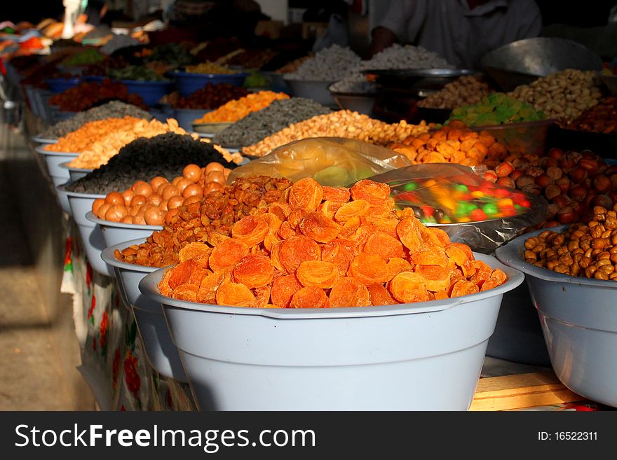 Bowls full of dried fruit on a marketplace