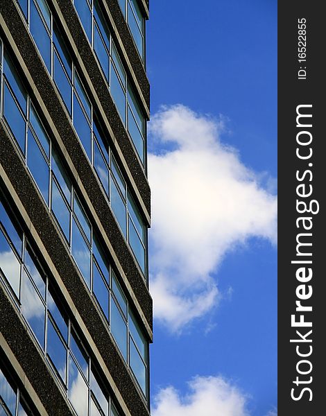 Image of a side of a building under the blue sky. Image of a side of a building under the blue sky