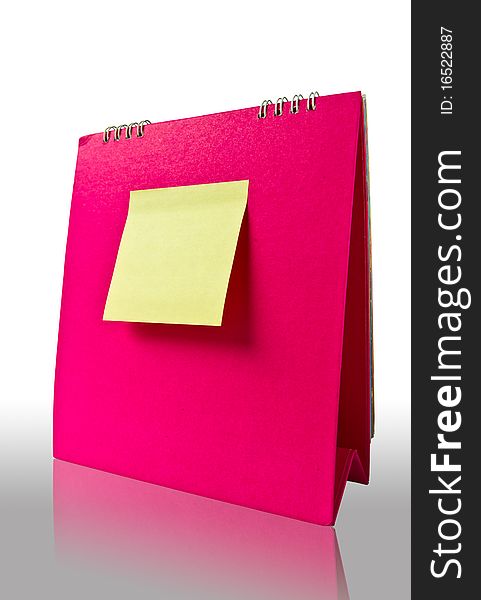 Yellow note on pink calender