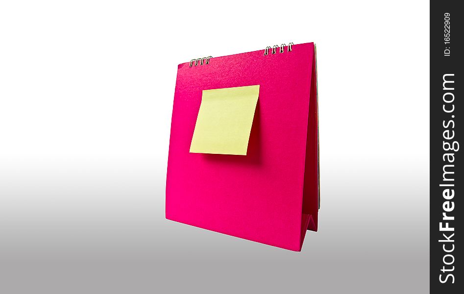 Yellow note on pink calender