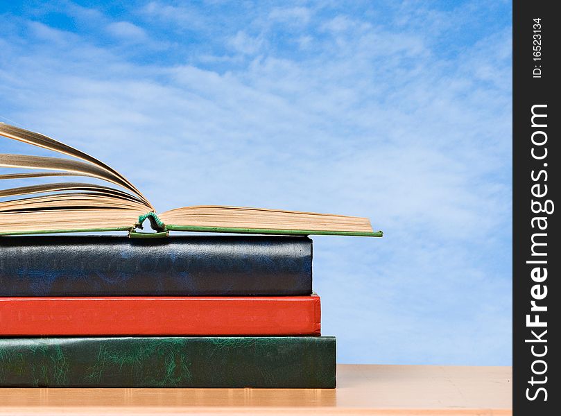 Pile of books on shelf