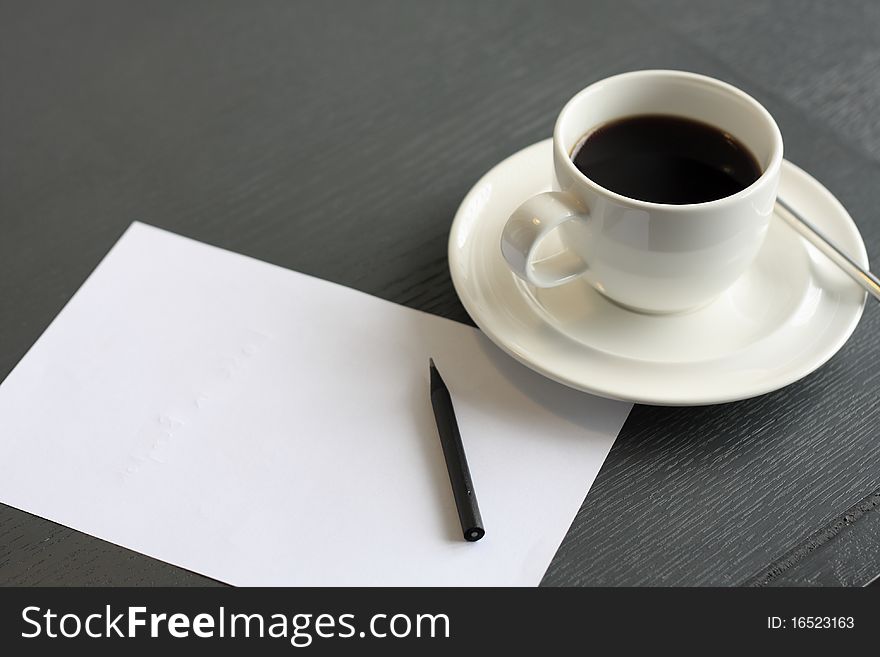 Coffee and notepaper
