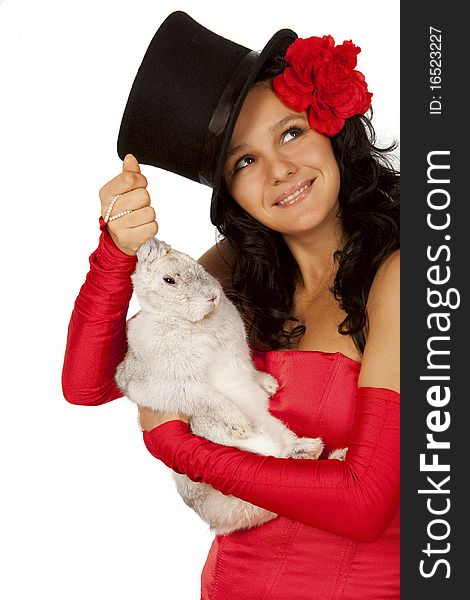 Closeup portrait of  a cute magician with  bunny against white background