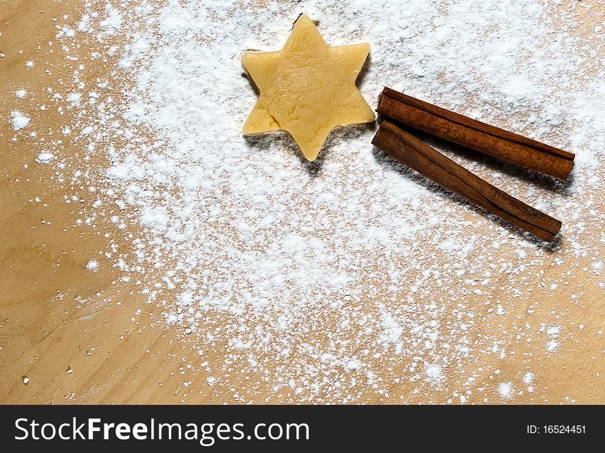 Star with cinnamon sticks in the flour with Copy Space