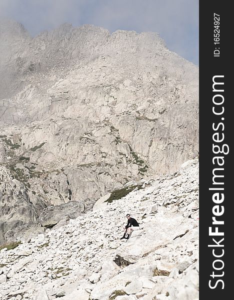 Person hiking the famous path GR20 at Corsica. Person hiking the famous path GR20 at Corsica.