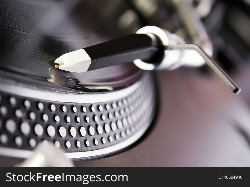 Turntable playing vinyl record