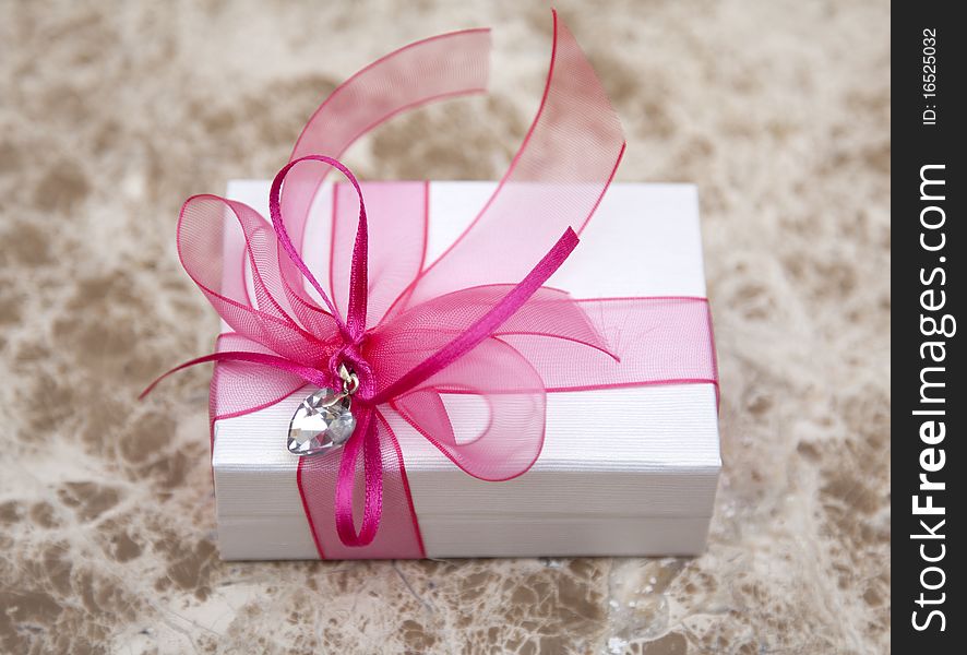 Gift box with ribbon end bow