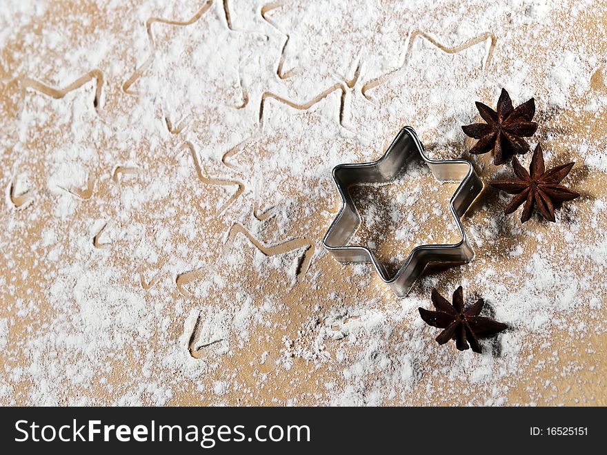 Star-shaped and star anise are in the flour with Copy Space. Star-shaped and star anise are in the flour with Copy Space