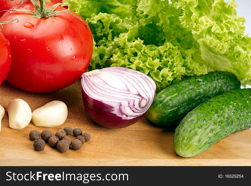 Fresh vegetables on wooden hardboard