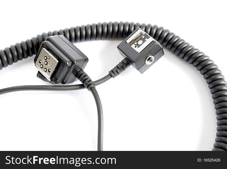 Black cord for flash and photo-camera isolated on white