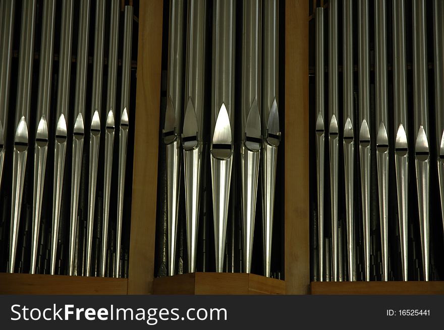 Organ pipes inside of an old Church.