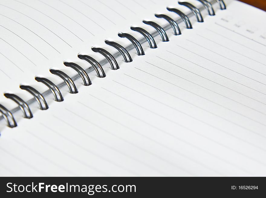 Close up of open Blank Spiral Notebook