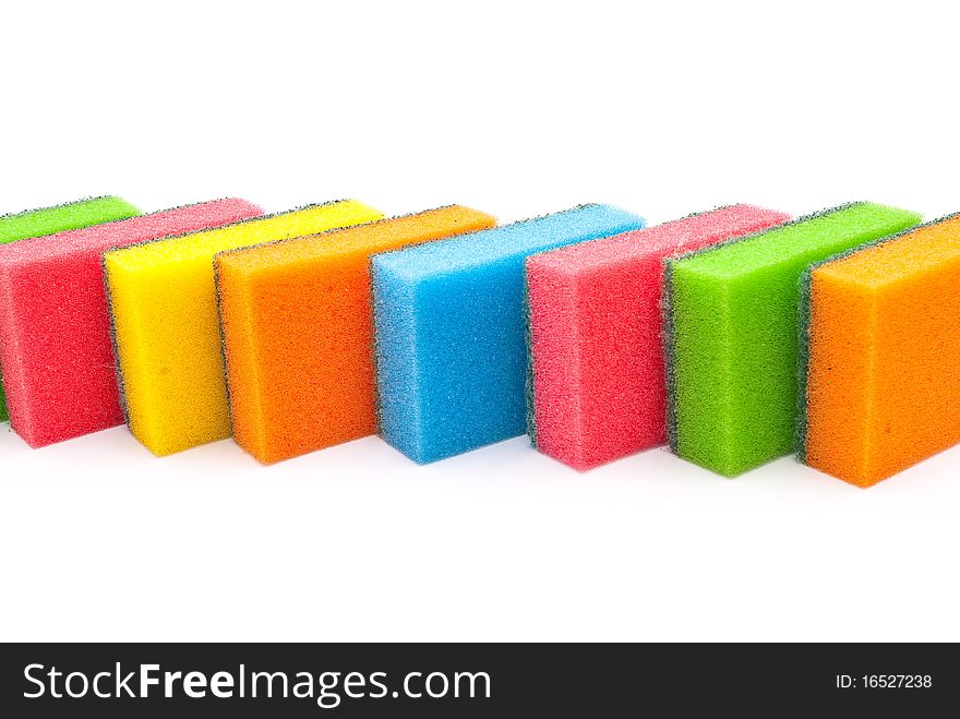 Coloured kitchen sponges on white